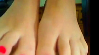 RED NAIL POLISH FOOT