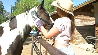 Ardent beauty in cowgirl hat goes interracial to be pounded doggy hard