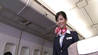 Japanese stewardess Nozomi Aso enjoys having sex with a pilot