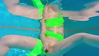 Horny redhead MILF fucks herself in the pool, until cock arrives!