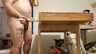 Slave finishes workbench by staining it