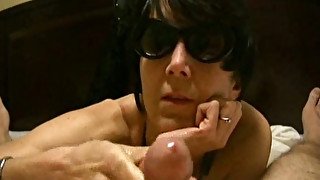 Wanton black haired MILF wife gives me tremendous handjob