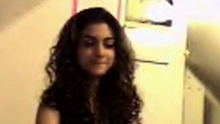 Sey young Indian babe on her webcam