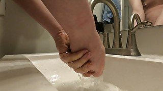 Washing hands nude (not porn)