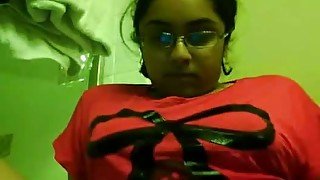 Chubby nerdy Indian brunette flashes her extremely hairy cunt