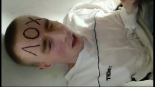 Young gay pissing on his face