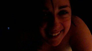 Brunette cutie smiling in the dark and eating my dick