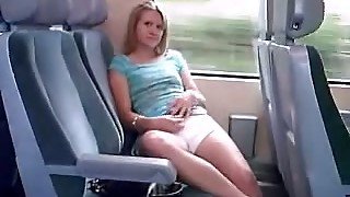 Sweet blonde girlfriend masturbates on a train seat