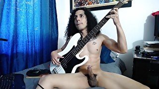 Playing Bass naked with a hard cock