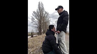 OUTDOOR GAY SUCKING WITH CUM