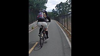 MILF ass in  skin tights biking on public bike trail