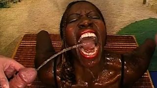 Exciting black beauty gets her holes banged deep and drinks hot piss