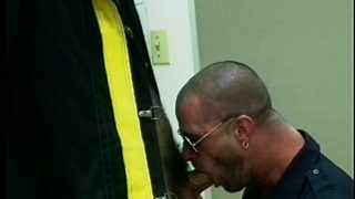 Dick-greedy fireman goes down on a hung policeman and gets a favor in return