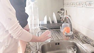 This girl uses my pissing cock to wash the dishes