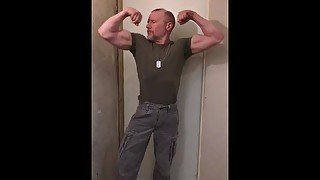 Muscular army guy flexing big biceps and shooting cum, ready to fight!