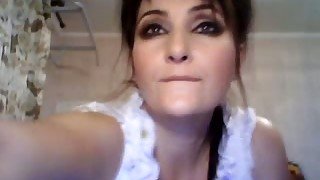 Full bodied MILF masturbating passionately in front of camera