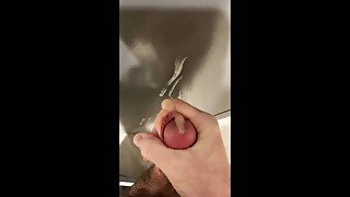 SHOOTING MY HOT HUGE LOAD ON THE GYM BATHROOM DOOR.