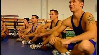 Three well-hung gay wrestlers make each other cum on their mat