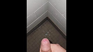 Latino Masturbating in a campus shower after workout