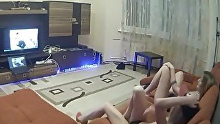 Two girls masturbating while watching porn