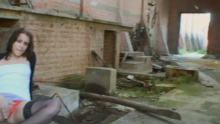 Slut fucking with man in abandoned building site