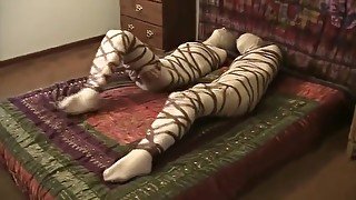 Two girls in mummy bondage