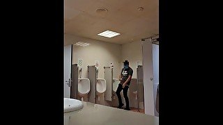 jerking off in a public toilet at Barcelona airport. almost caught by the cops. very hot risky