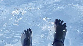 Feet in the water