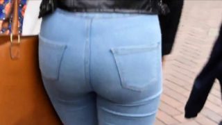 Candid blonde teen with sexy curves in jeans