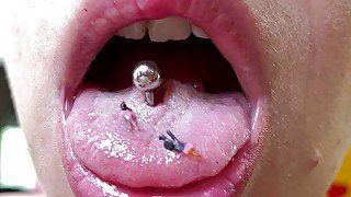 Mouth fetish giantess with model train people extreme close up