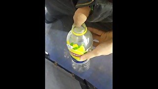 Filling a bottle with golden piss