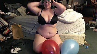 Chubby Teen Blowing and Popping Balloons