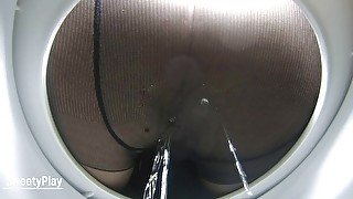 Peeing wetiin pantyhose toilet cam