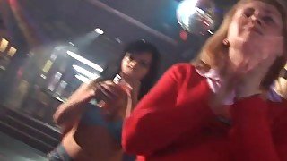 Girls suck a guys cock in a club