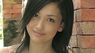 Brunette cutie from Japan Reon Kadena swims in pool