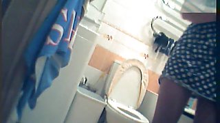 Girl in polka dot dress upskirt masturbation in toilet