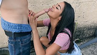 Vienna Black orally serves the big dick outdoors