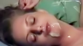 Cumshot drips off her chin