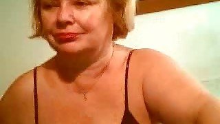 Huge boobed granny living next door masturbates in front of me