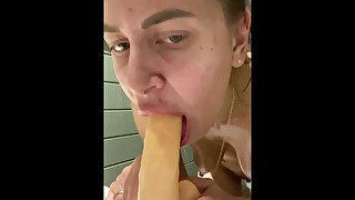 Undressed in the restaurant toilet and started fucking herself with a dildo