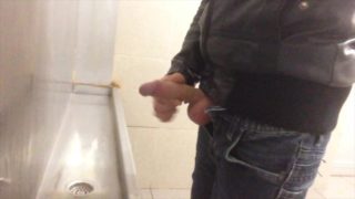 Pissing and jerking in public urinal