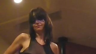 Masked milf dances and plays with her pussy