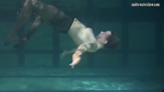 Lenochka Chernova goes swimming naked and plays underwater