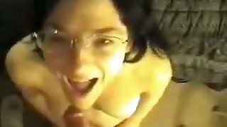 Nerdy brunette chick wants her glasses to be covered in cum