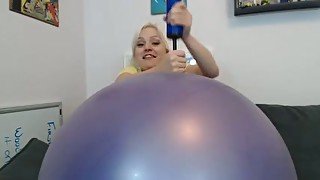 Hilarious blonde nympho with big boobies was playing with inflatable toy