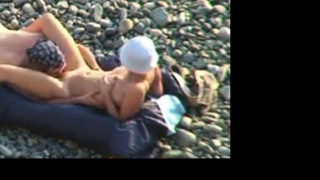 Voyeur on public beach. Oral sex