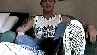 Deviant twink shows his bare feet and tugs dick solo