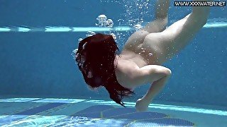 Jessica Lincoln in her pink bikini in the pool