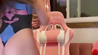 Sexy DVA cosplay girl riding toy in game chair