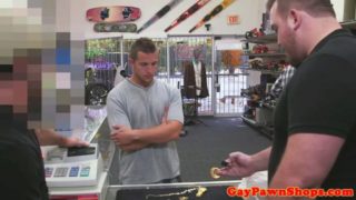 Baited pawnshop customer sucks cock